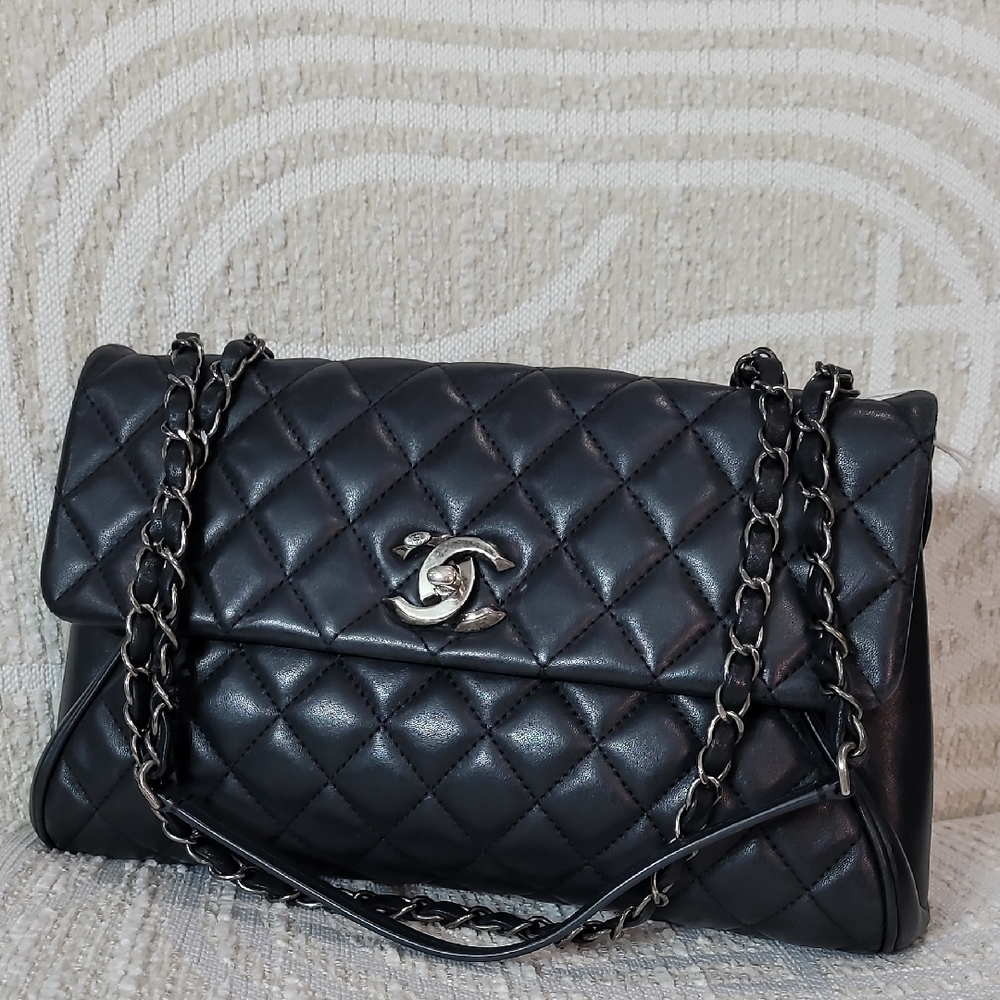Chanel Fold up Black Quilted Chain Bag